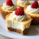 Delicious mini cheesecakes topped with fresh berries and whipped cream